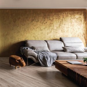 Modern Living Room with Leather Sofa and Golden Wall Accent