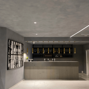 Modern bar interior with a sophisticated lime-based plaster ceiling and walls, complemented by gold pendant lighting and a sleek design.